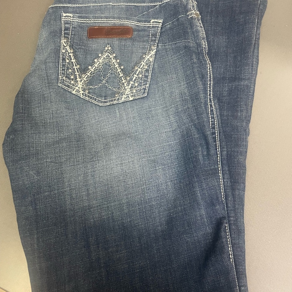 Wrangler Blue Boot Cut Jeans with Unique Stitching